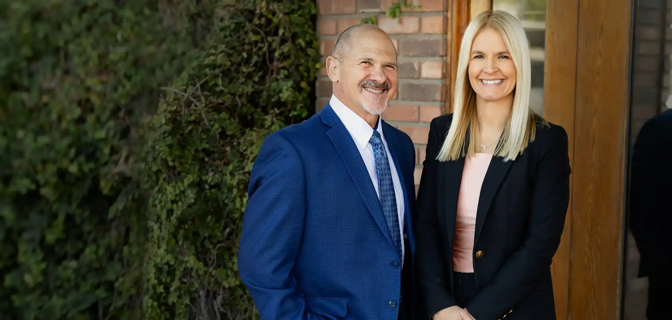 Attorneys Jack Hirsch and Chelsie Talcott outside their Phoenix office